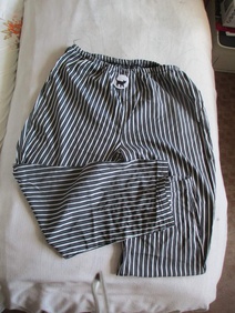 Kalhoty pruhované černá bílá vel 56